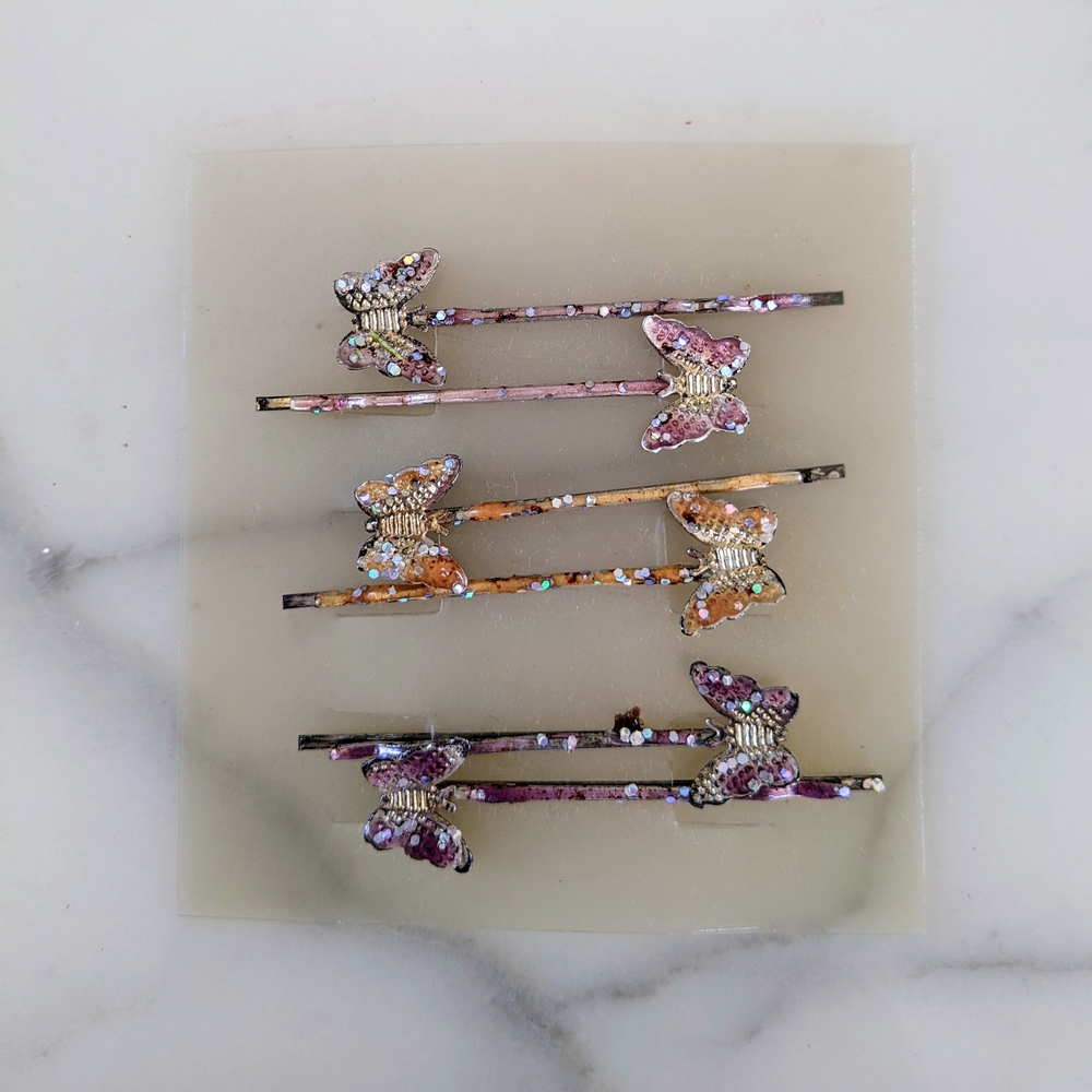 NWOT. Multicolor Butterfly Shaped Hair Clips with Sparkles.